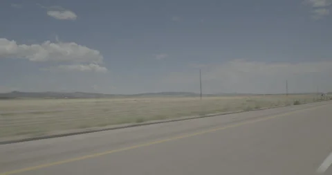 Front left driving plate - I-15 at Mile 47 Cedar City Stock Footage 288412779