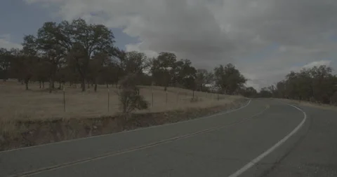 Front left driving plate - Irish Hill Road at Highway 104, Amador County Stock Footage 293594024