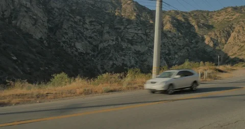 Front left driving plate - Malibu Canyon Rd Stock Footage 101713441