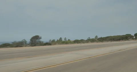 Front left driving plate - PCH at Crystal Cove State Park, Newport Beach Stock Footage 101982056