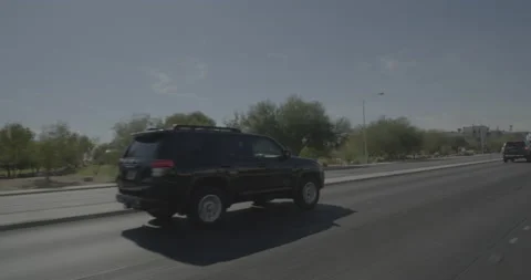 Front left driving plate - Sunset Boulevard at Tomiyasin Lane, Las Vegas Stock Footage 293941509