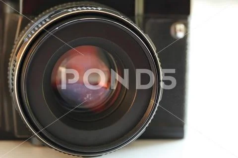 Front lens of the vintage black camera and have copy space. Stock Photos