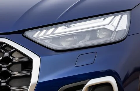 Front light of a blue car Stock Photos