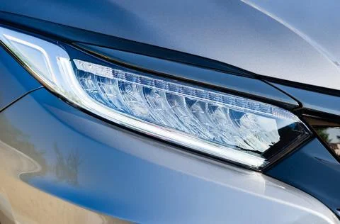 Front light of a silver car Stock Photos