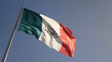 Front lit large Mexican flag waving in the wind. Stock Footage 86128354