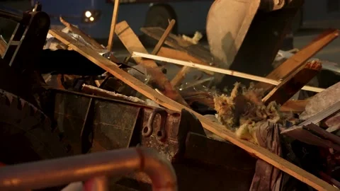 Front loader and excavator remove construction debris Stock Footage 170293968