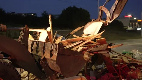 Front loader and excavator remove construction debris Stock Footage 170294013