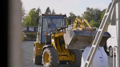 Front Loader Lifting Large Construction Material Bag at Site Stock Footage 332976505