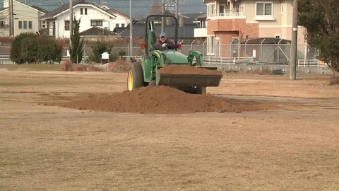 A Front Loader Moving Dirt co Video stock 116619016