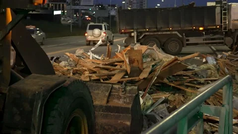 Front loader picks up construction debris Stock Footage 170293823