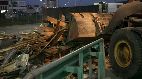 Front loader picks up construction debris Stock Footage 170293834