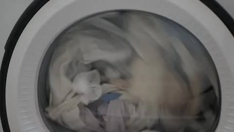 The front loading dryer rotates Video stock 327680959