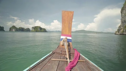Front of long tail boat floating on sea water in southern Thailand Stock Footage 141184650
