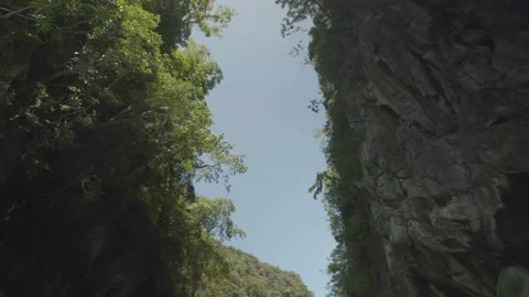 Front of long tail boat floating on water going to lagoon in Krabi Stock Footage 153509255