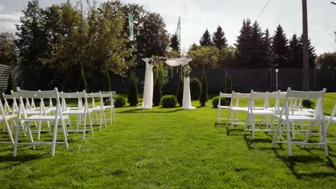 Front low view of the wedding arch in a green field. Wedding ceremony Stock Footage 169482462