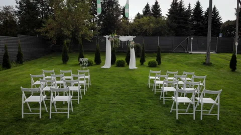 Front low view of the wedding arch in a green field. Stock Footage 169482656