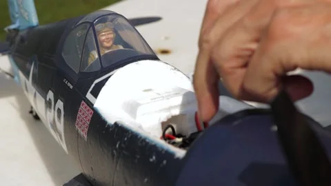 Front Of Model Plane Gets Removed To Connect A Battery Stock Footage 130676669