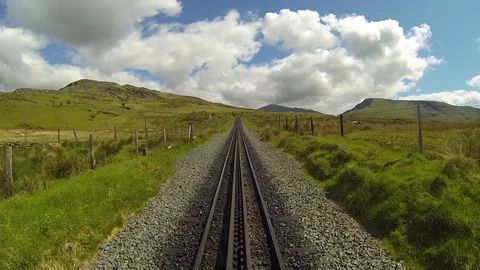 Front mounted train shot of track in middle of frame. POV. Vídeos de archivo 90103948