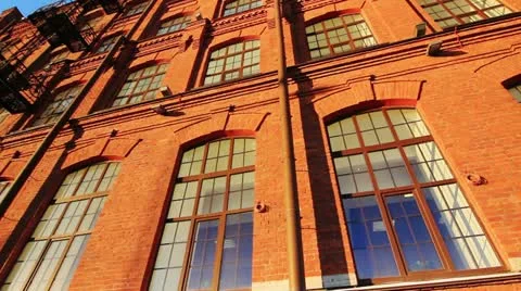 Front of an old red brick building Видео 22330796