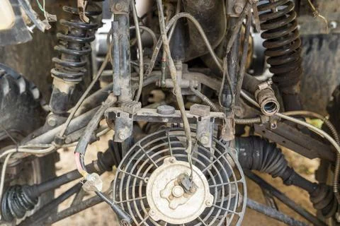 The front part of a broken and disassembled ATV in need of repair Foto stock