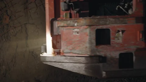 Front part of heavy mining machinery with bright headlights Stock Footage 235456093