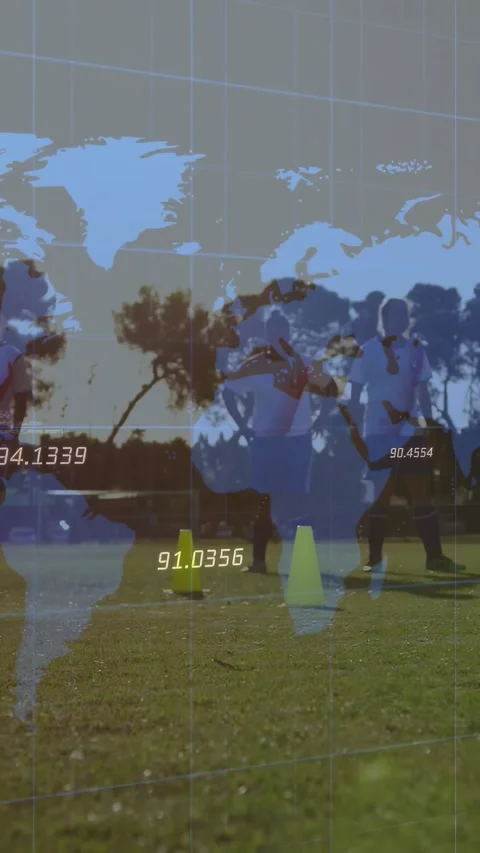 Front player toeing soccer ball, starting sports drill, faint world-map overlay Stock Footage 330982130