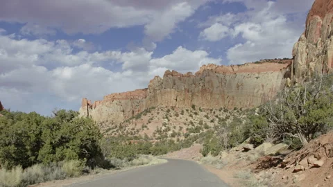 Front point of view perspective of driving through Escalante Utah canyon Stock Footage 248581437
