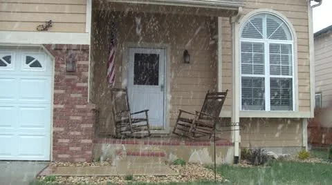 Front porch in snowstorm Video stock 10891073