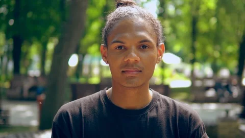 Front portrait young man in city Stock Footage 112961354