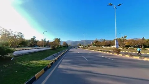 Front Pov View of Car Driving Through Under Pass, Blue Sky in the Background Stock Footage 172621037