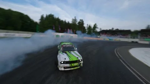 Front to Rear FPV Drone Transition Tracking Smoky Tandem Drift Run Stock Footage 336102143