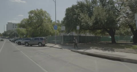 Front right driving plate - East Dean Keaton Street at San Jacinto Boulevard, Stock Footage 253499093