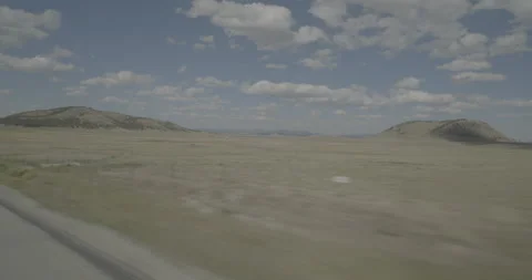 Front right driving plate - Highway 285 at Mile 164 Park County Stock Footage 288959500