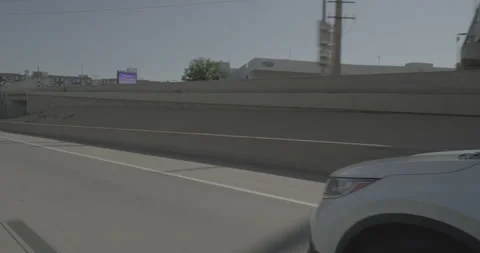 Front right driving plate - Highway 25 at Bellaire Street Denver 動画素材 289261491