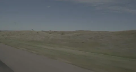 Front right driving plate - Highway 71 at Mile 37 Banner County Stock Footage 290004294