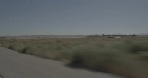 Front right driving plate - Highway 58 at Mile 30, Barstow Stock Footage 293782391