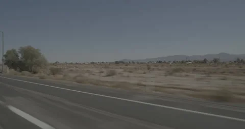 Front right driving plate - Highway 15 at Mile 84, Yermo Stock Footage 293786375