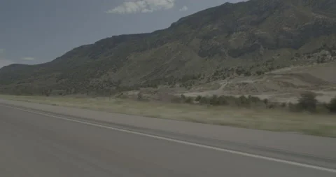 Front right driving plate - I-15 at Mile 34 Snowfield Stock Footage 288402728
