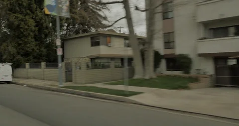 Front right driving plate - Laurel Canyon Blvd at Valley Spring Lane, Studio Stock Footage 113787326