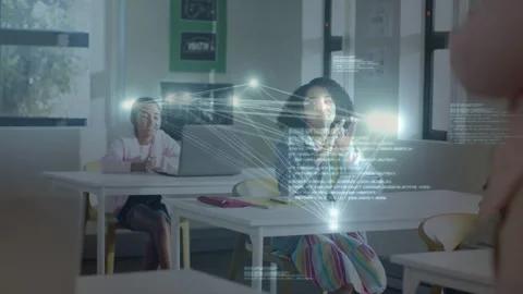 Front-right student raising hand and creating nodes and lines, forming AR Stock Footage 334703129