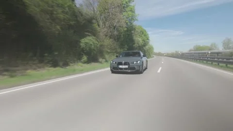 Front Rolling Shot – Speed Lane Switch with Cinematic Filters (Editorial) Stock Footage 309490476