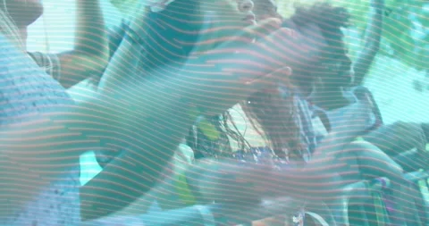 Front-row audience pressing rail and clapping, reacting to band playing while Stock Footage 333900539