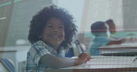 Front-row boy smiling and moving hand, digital overlay appearing and mapping Stock Footage 328396569