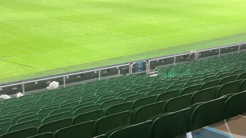 Front row stadium seating green seats an... | Stock Video | Pond5