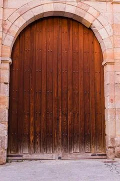 Front rustic door texture background. wooden traditional vintage pattern Stock Photos