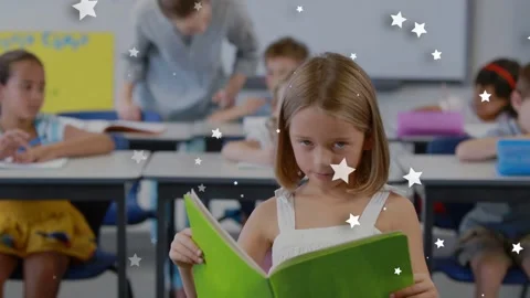 Front school student reading green book for class, sparking stars moving as Stock Footage 333893991