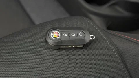 Front seat in car interior with keys close up  2016 Fiat 500 Abarth Stock Footage 159865416