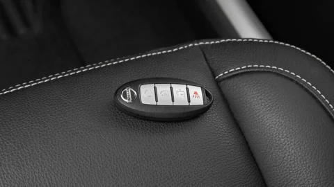 Front seat in car interior with keys close up  2016 Nissan Titan XD PRO-4X Stock Footage 159878537