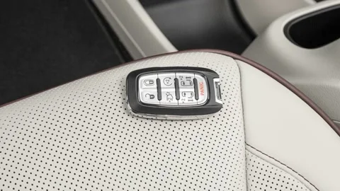 Front seat in car interior with keys close up  2017 Chrysler Pacifica Limited Stock Footage 159886829