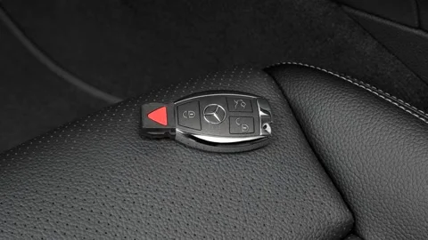 Front seat in car interior with keys close up  2017 Mercedes-Benz C-Class C300 Video stock 159893194